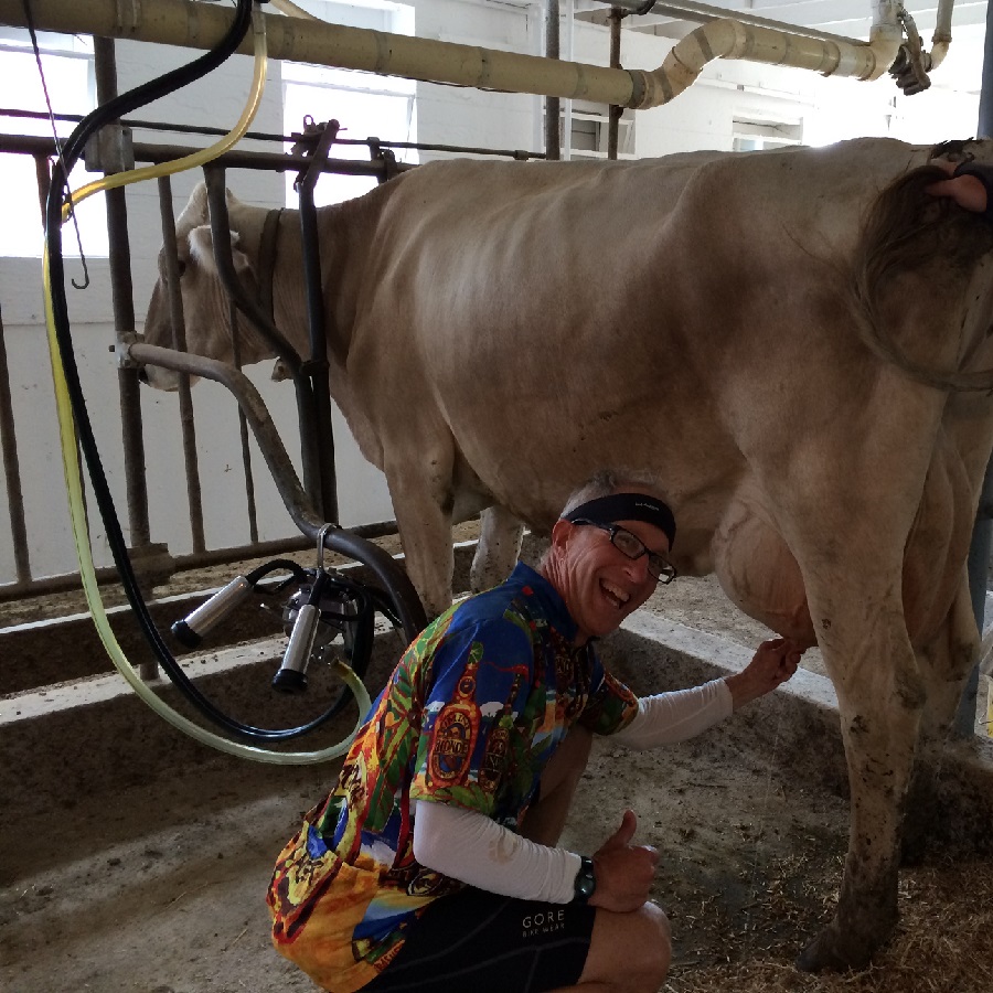 When he isn't biking this cyclist is eager for a new experience like milking a cow, which he did on the 2015 Swiss Cheese & Spotted Cow Bicycle Tour.