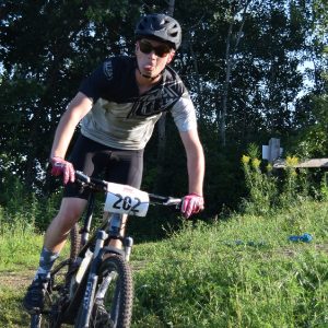 This funny mountain biker is showing off some of his best facial features. This photo was shot at Penn Cycles Thursday Night Races on Buck Hill, near Lakeville, MN