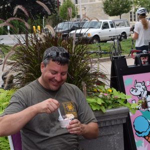It's Ice Cream Smiles Friday and this week we found our Pic of the Week taking a break from his ride to enjoy a cool treat the La Crosse Bike Festival.