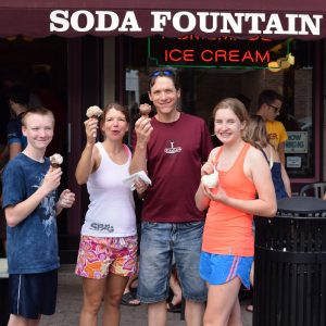 Ice cream smiles Friday, at the La Crosse Bicycle Festival. Here is a family who just checked to the events and found one of the four unique sweet shops in town.