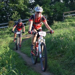 Summer mountain biking fun on the Hill at the Penn Cycle's Thursday Night at the Races on Buck Hill. Photo taken near Lakeville, MN on August 4, 20 16.
