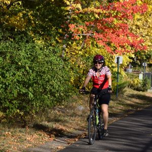 Here this cyclist is enjoying Minnesota's peak riding time on the Minneapolis Greenway Trail.