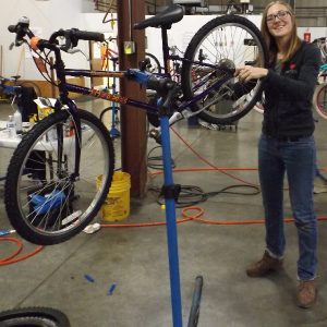 adjusting a rear derailleur on a mountain bike