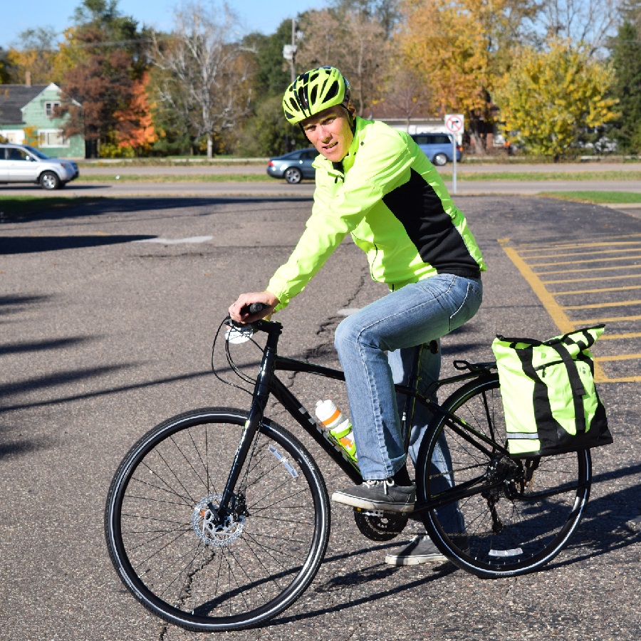 For fall bike riding high visible clothing and saddle bag gear are easier for motorists to see.