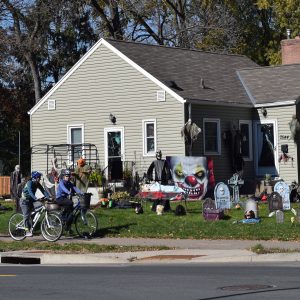 Another colorful day to get on your bike and explore the neighborhood, searching for homes with Halloween Decorations spread in the yard to spook those who pass by.