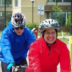 Having fun bike riding in the rain and snow. We captured these two cyclists riding their bikes in Winona, MN