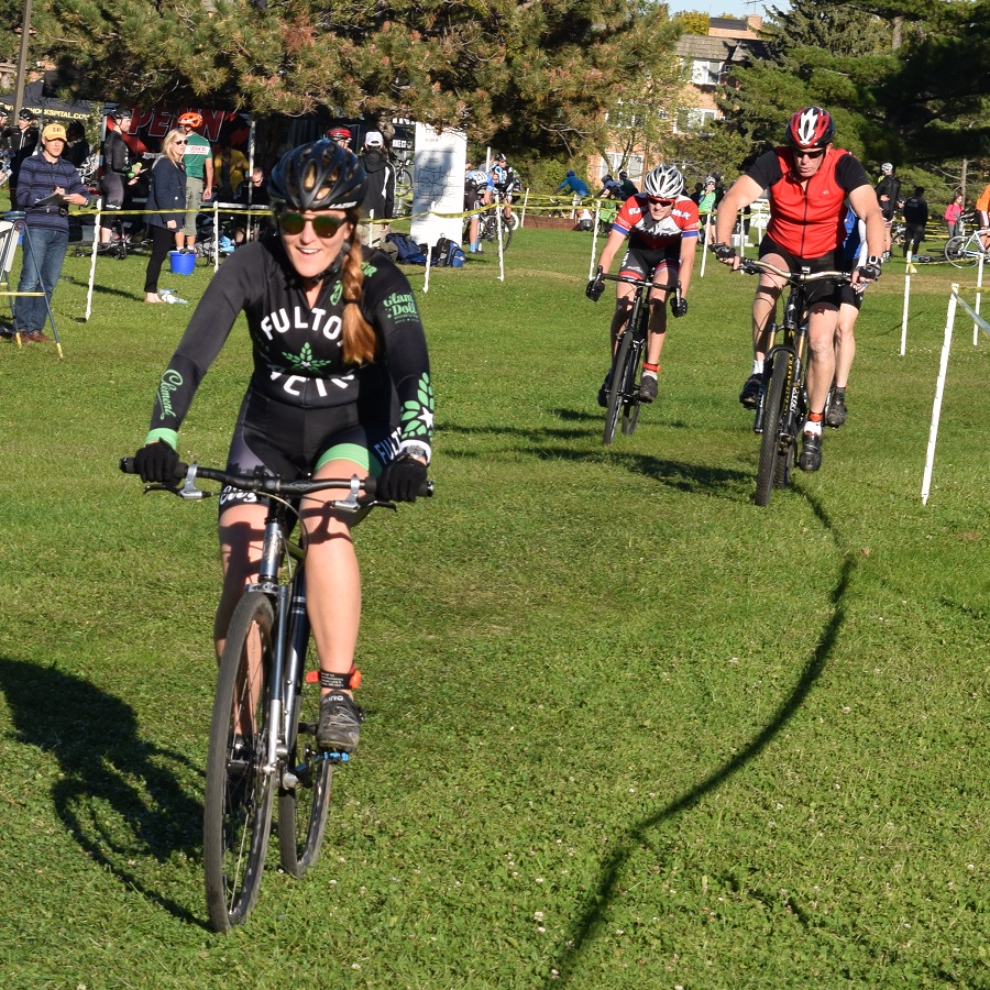 Miles of Smiles as this happy Fulton biker chick takes the lead on her cross bike.