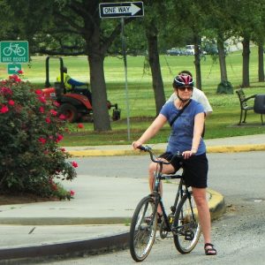 Biking into New Orleans on the Mississippi River Trail in April the flowers are blooming.