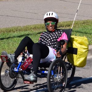 A beautiful spring ride, this bike commuter is ready with rain gear in her bag if the afternoon ,rain predicted roll in.