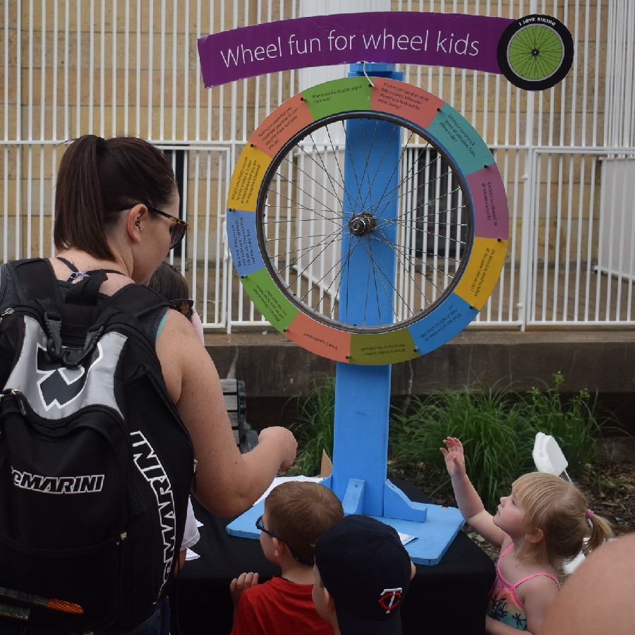 The next Safety Safari stop kids had a chance to spin the wheel, learn about crossing the road, signaling their turn while riding a bike and winning a bike light.