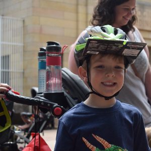 Another happy cyclist with a new bike helmet.