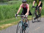Many Cyclists riding around Albert Lea Lake enjoyable