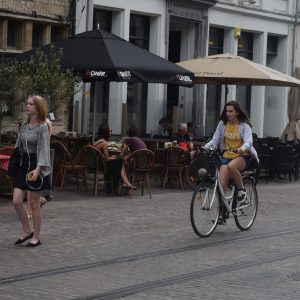 Riding along the street Cafes in Amsterdam