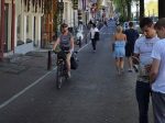 Pedaling along the bike lane in Amsterdam