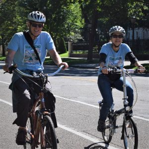 Here are a couple biker having some fun pedaling into the Monday morning sun on a early fall picture perfect day in St Paul.
