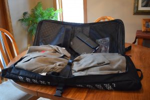 The items in the luggage case above comfortably fits into the Classic Garment Pannier , with room fr a sports jacket and a laptop.