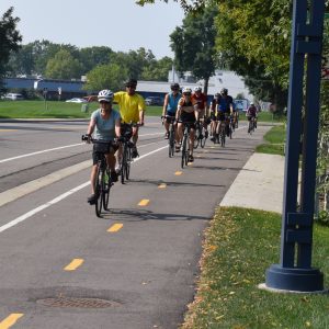 We found this picture, taken last year, of a group of bikers enjoying warm weather, sunshine and fond memories while rolling into Bloomington, MN from the western suburbs of the Twin Cities.