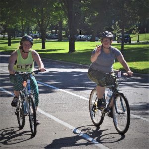Fond summer memories riding the Saint Paul Classic Bicycle Tour, as these two biker chicks demonstrated riding down Summit Avenue.