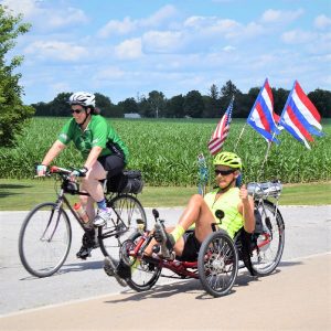 Fond summer memories on 2017 RAGBRAI, as this biker chick and dude ride across Iowa enjoying the scenery.