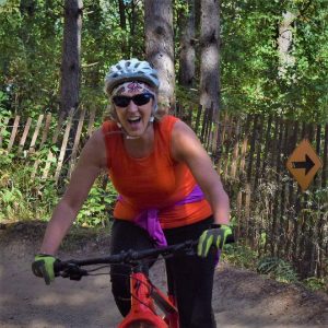 Fond summer memories with spring weather only a few days away. Here in this pic a biker chick, last season, was enjoying some time on one of Minnesota's trails.