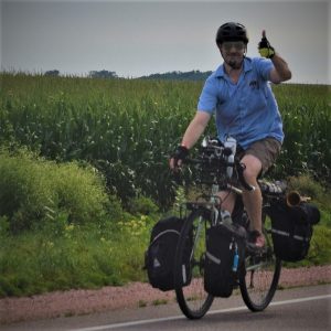 It’s Friday and time think about getting together and planning some rides for the warmer months ahead. Here in this photo, last year, we caught this touring biker dude riding across Minnesota, west of Albert Lea, having fun.
