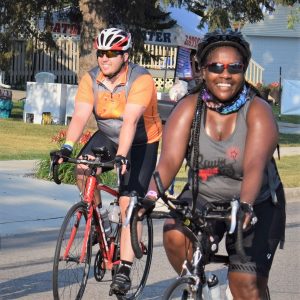 Riding into the Monday morning sun as we continue to warm up on #23 of 30 Days of Biking. Today's photo was taken on RAGBRAi and shows a biker chick having a great time along the route. What a fun way to bike across Iowa!