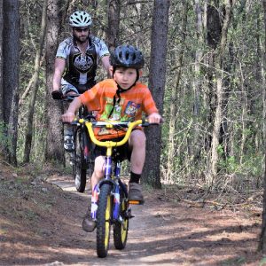Fond early summer memories riding the mountain bike trail. Here in today pic we caught this father/son duo enjoying some time together while testing their riding skills in Lebanon Hills Park