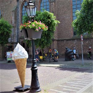 On this ice cream smiles Sunday, #fifteen of 30 Days of Biking in April, we look back at warmer days when this group of cyclists in the Netherlands stopped in a small town along the canal to enjoy a cool sweet treat.