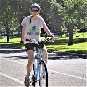 Riding into the Tuesday morning sun as we continue to warm up on #24 of 30 Days of Biking. Today's photo was taken of a biker chick having a great time along a Twin Cities route preparing for an upcoming ride you can find new HaveFunBiking Guide.