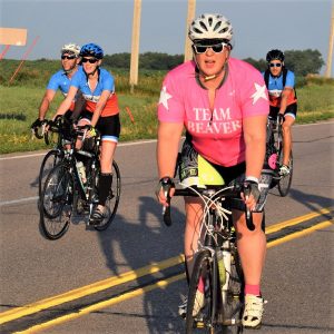 Riding into the Monday morning sun as our spring weather, feels more like June temperatures. Today's photo was taken on RAGBRAi and shows a biker chick having a great time along the route. What a fun way to bike across Iowa!
