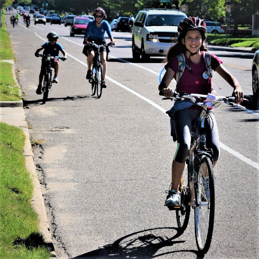 Here is today's bike pic on this beautiful Tuesday, with this young biker chick enjoying an outing riding in St Paul, Minnesota. along the Mississippi River Trail.