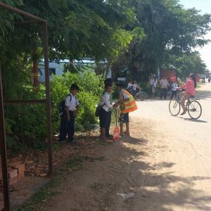 School crossing guards on Cambodian Highway