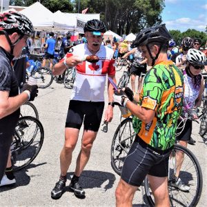 Here in this Bike Pic, taken on RAGBRAI 2017, we found this biker dude enjoying a succulent turkey drumstick.  