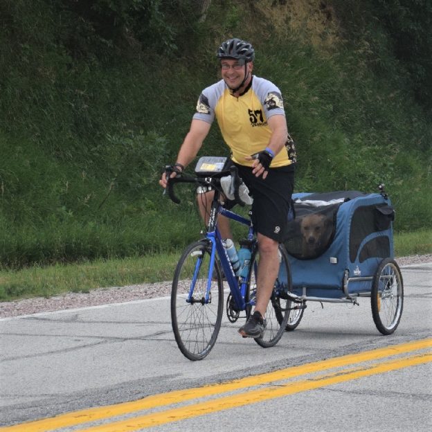 This Bike Pic Friday we are showing you another biker dude, with his faithful companion in the burley making memories, riding across Iowa several weeks ago. Along the way it seems everyone had a good time. See more photos at RAGBRAI 2018.