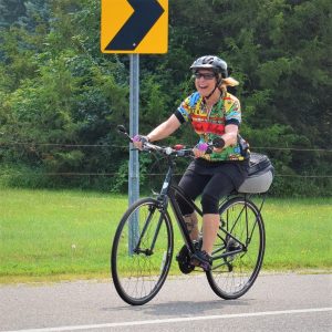 In this Thursday bike pic we caught this biker chick having fun riding on the Mississippi River Trail, west of Hastings, MN towards Pine Bend.