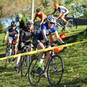The cycle-cross course is marked with yellow tape.