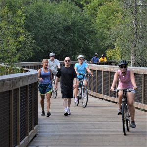 Riding through Edina on the wide wooden trail structure.