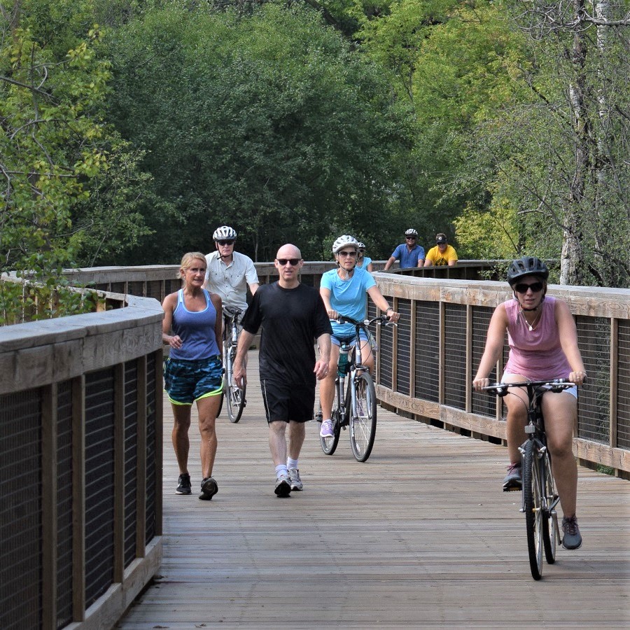 Riding through Edina on the wide wooden trail structure.