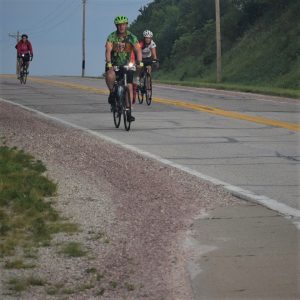 Stay visible by using both headlights and taillight and wearing clothes motorists can see.