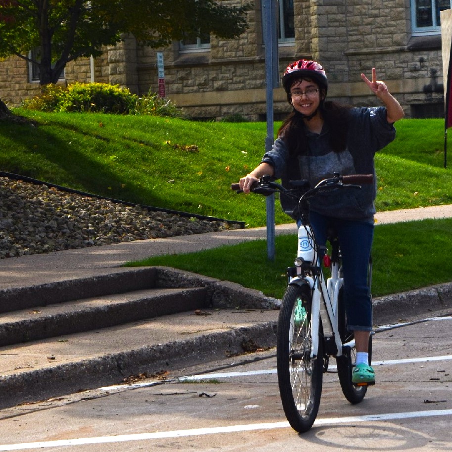 Zamira, testing out her new e-bike.