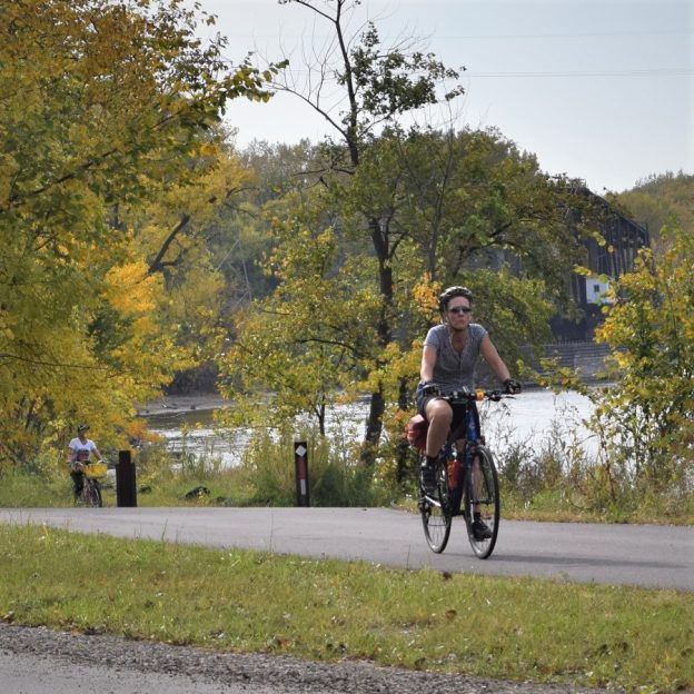 A bike pic to remember! This perfect fall weather day we caught this biker chick, pedaling along the Mississippi River Trail, on the first day of November.