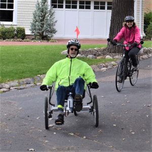 Here in this recent bike pic, we captured a biker dude on a recumbent bike, and a biker chick following behind having fun pedaling into the Monday morning sun on a recent history tour.