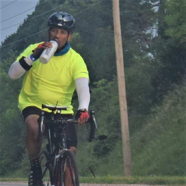 This Bike Pic Saturday we are showing you another biker dude riding across Iowa this last summer and remembering, regardless of the air temp to take a swig of water periodically. See more photos at RAGBRAI 2018.