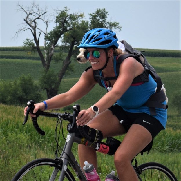 This Bike Pic Friday, digging through the summer archives we found this biker chick enjoying the Iowa countryside with her best friend, on the ride across Iowa, RAGBRAI.