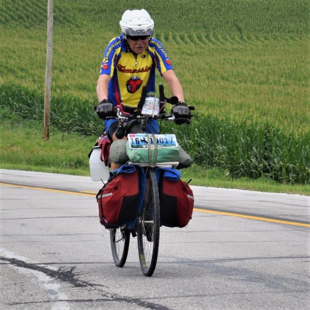 Here in this bike pic Monday, looking through the summer archive, we captured this bike dude, from Wyoming, riding into the morning sun while pedaling across Iowa. See more fun photo on the RAGBRAI 2018 website.