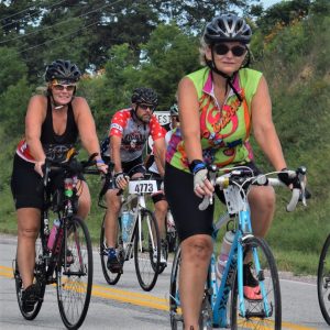 Here in this Thursday bike pic, looking through the summer archive, we captured these biker chicks riding across Iowa.