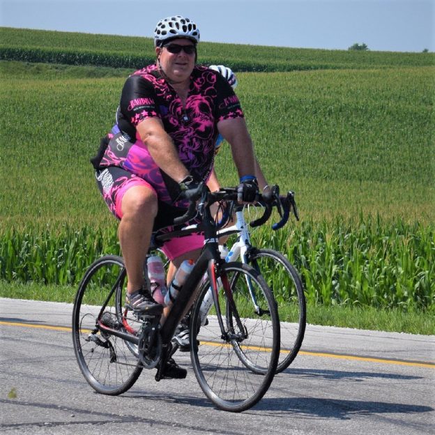 This Thursday bike pic, looking through the summer archive, we found this bike dude riding across Iowa, with with the sun shining brightly. See more fun photo on the RAGBRAI 2018 website.