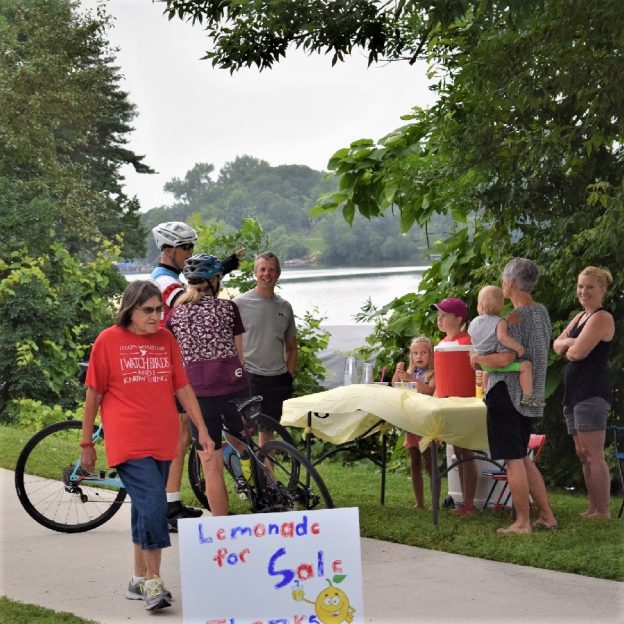 This Bike Pic Tuesday, digging through the archives, we caught these bikers stopping at a lemonade stand along Fountain Lake in Albert Lea, MN. 