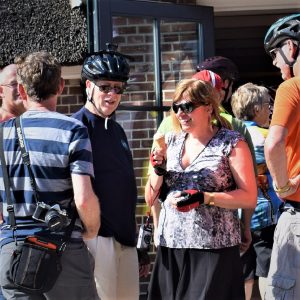 On this bike pic Sunday, looking through the archives. We found this photo of a biker chick enjoying a tasty treat, surrounded by biker dudes, on a bike/bike barge trip in the Netherlands last year.