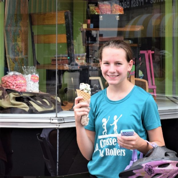 On this bike pic Sunday, with a perfect bold north weather day we found this photo of young biker chick enjoying a tasty treat. The photo was taken last summer at the LaCrosse Bicycle Fest.